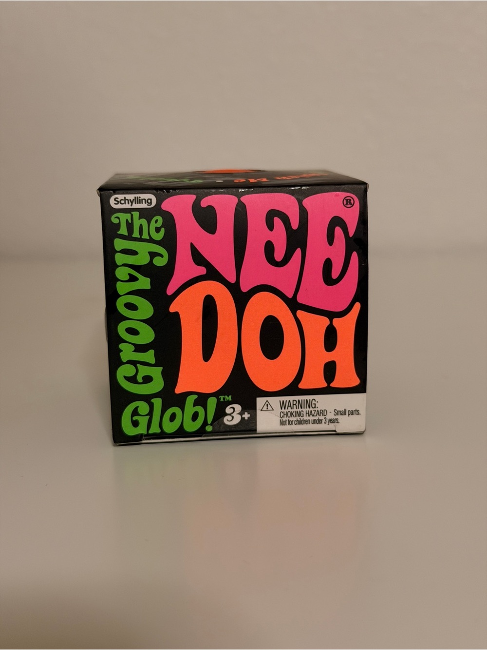 The NeeDoh Groovy Glob Stress Ball - Bright Orange